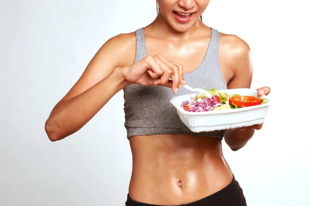 lady eating a meal with white background